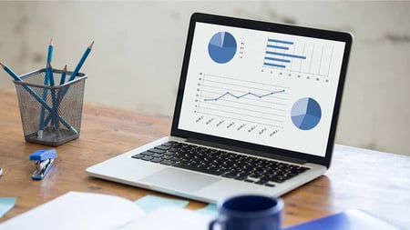 Insurance documents and calculator representing financial expertise